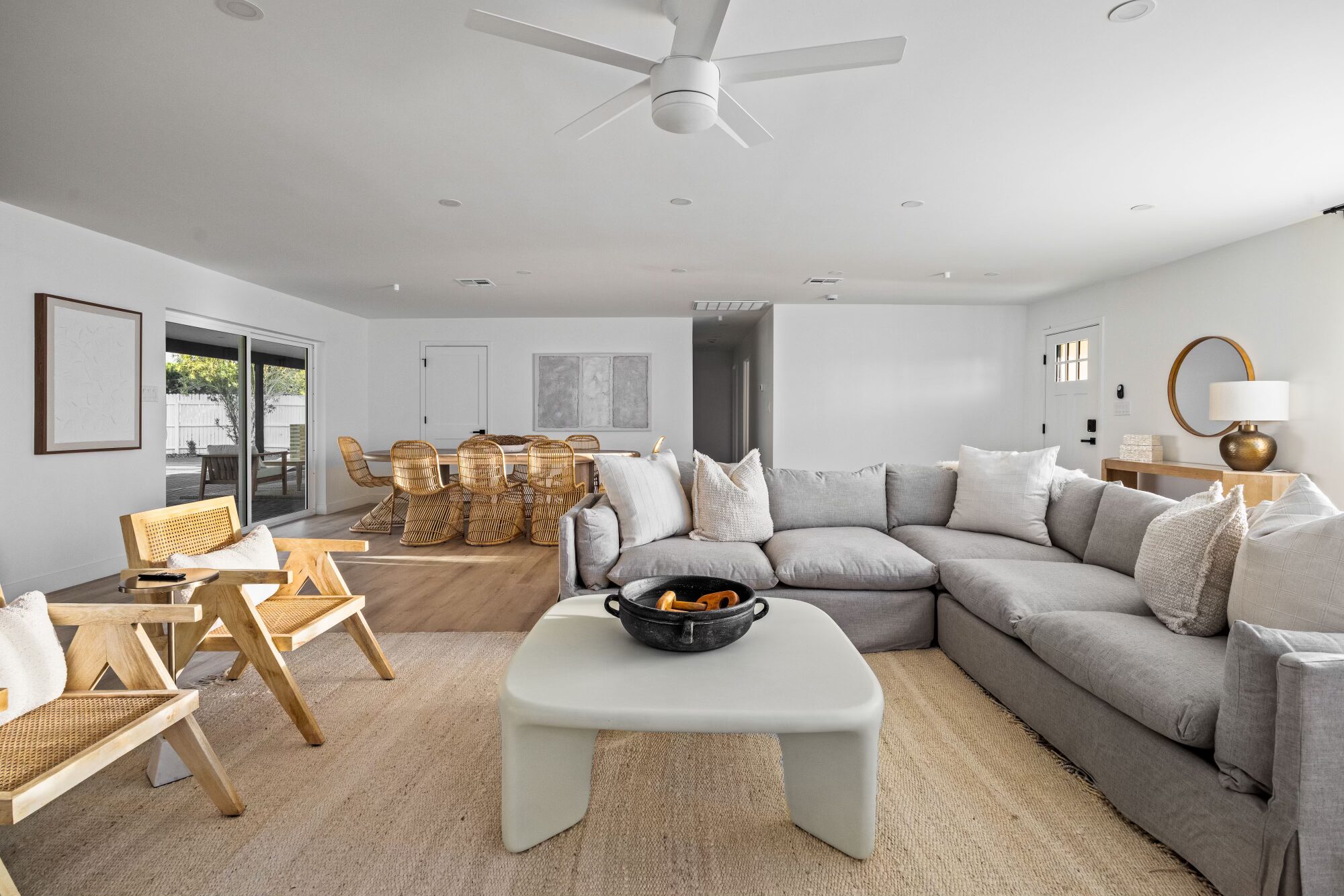 Renovated home interior with open layout, natural light, and modern finishes